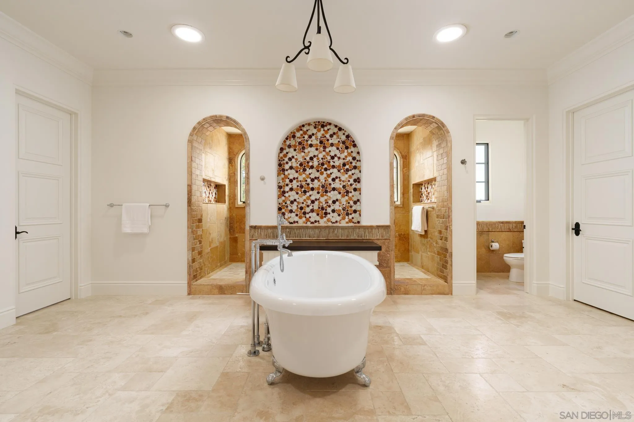 6248 Strada Fragante Rancho Santa Fe, CA 92091 - Photo 21 of 38 a bathroom with a tub mirror and window