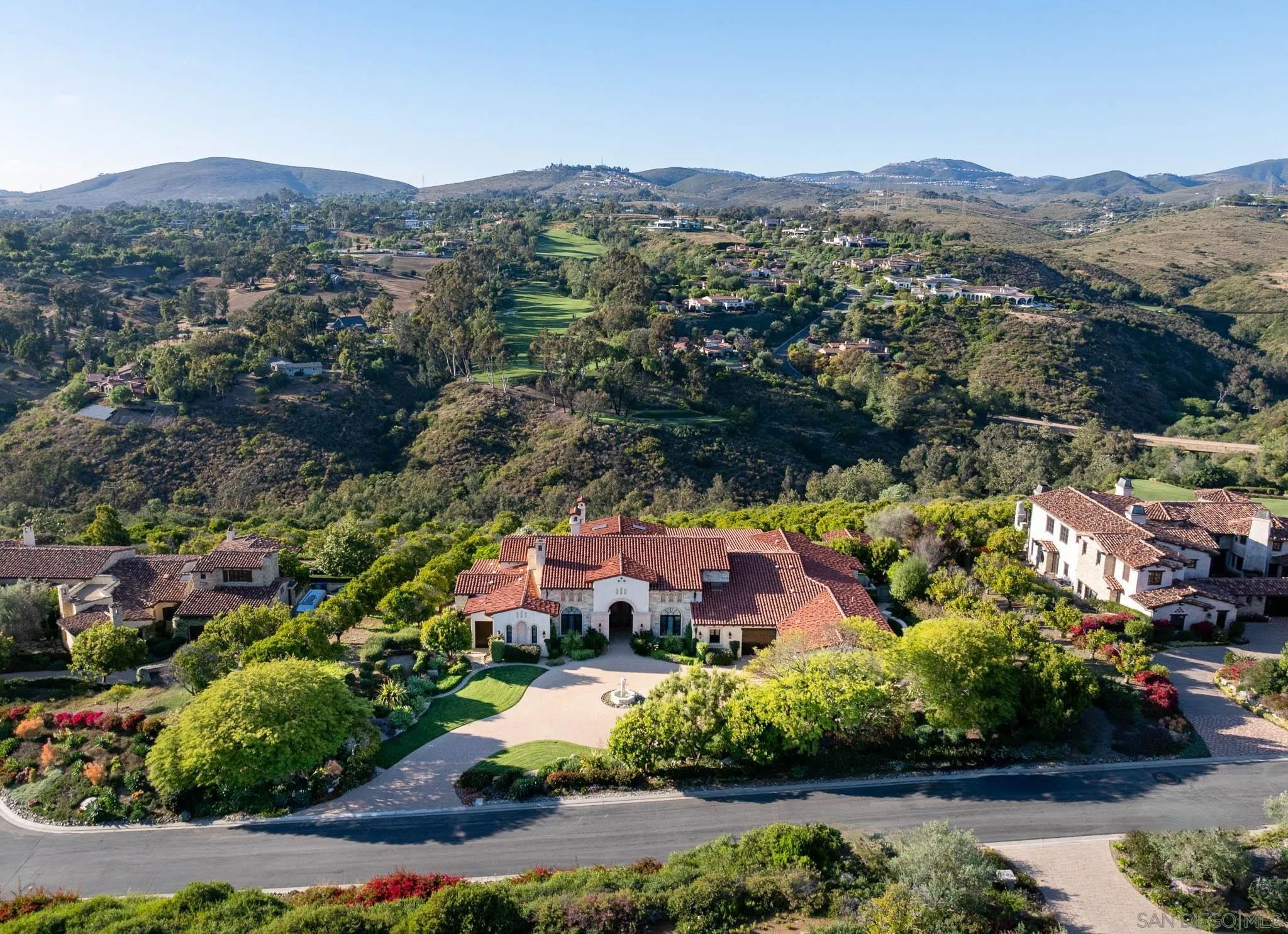 6248 Strada Fragante Rancho Santa Fe, CA 92091 - Photo 30 of 38 an aerial view of house with yard swimming pool and mountains
