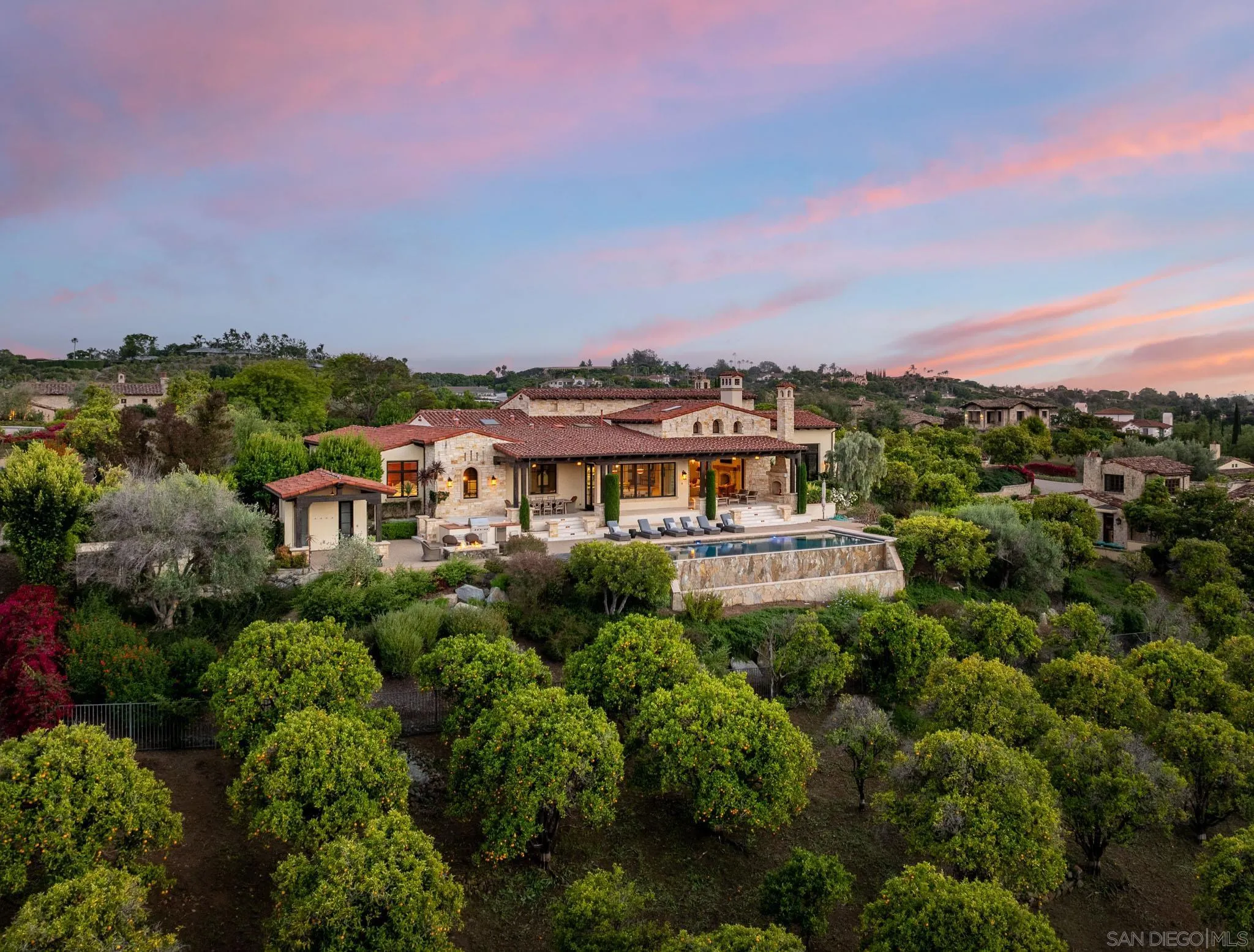 6248 Strada Fragante Rancho Santa Fe, CA 92091 - Photo 34 of 38 an aerial view of a house with a yard and mountains