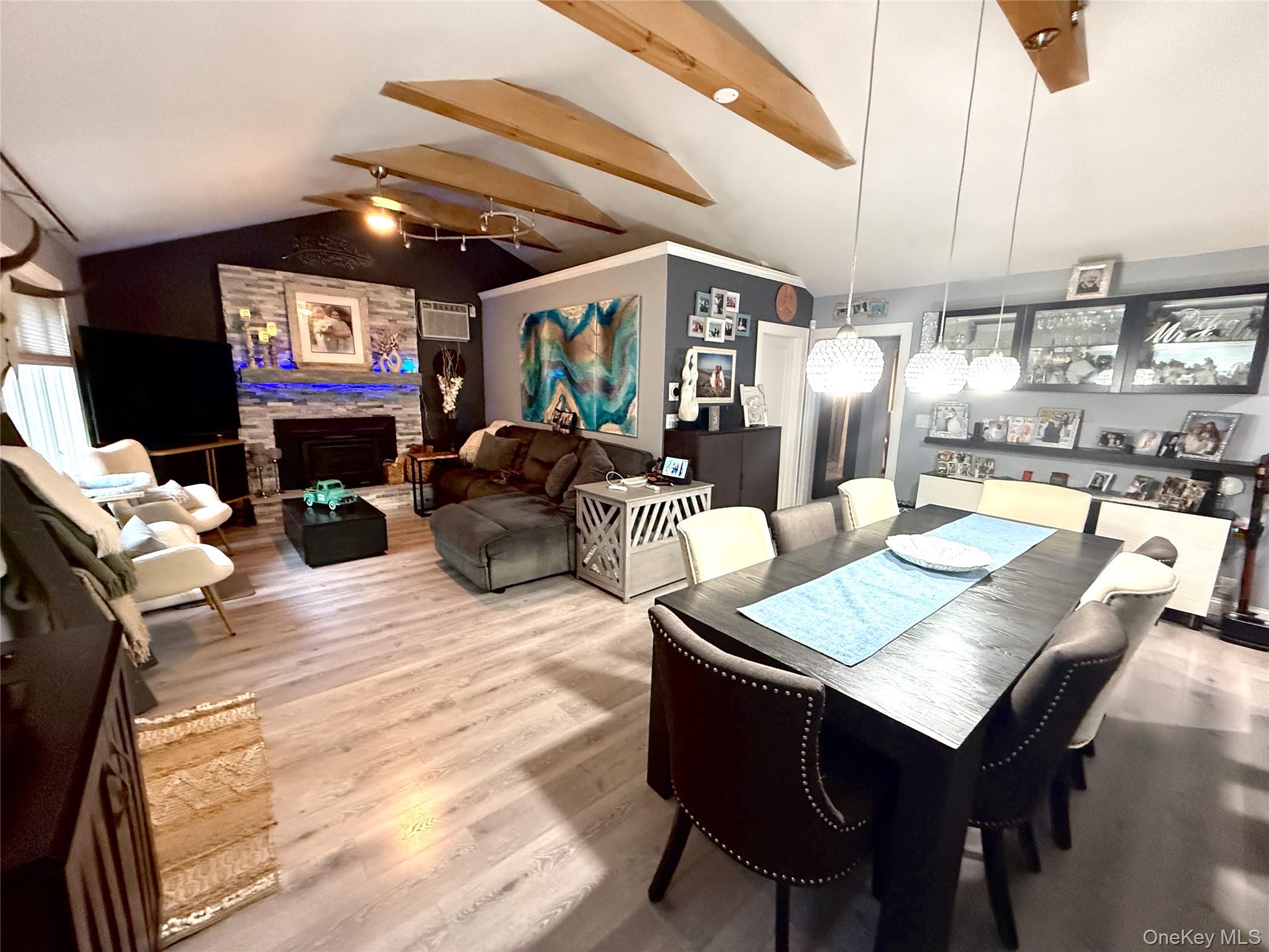 30 Classon Avenue Mastic, NY 11950 - Photo 13 of 21 Dining room featuring light wood-type flooring and a wall mounted AC