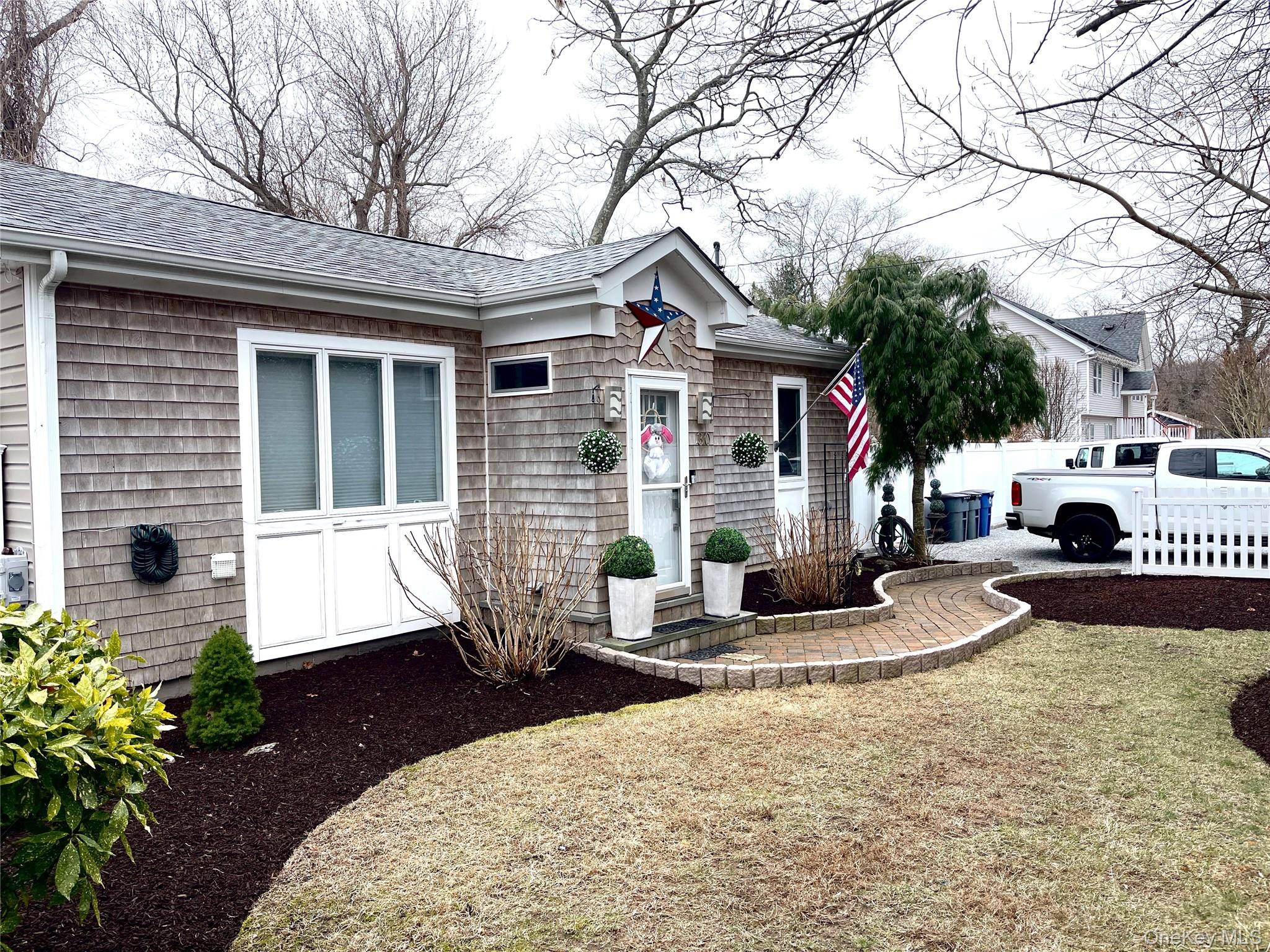 30 Classon Avenue Mastic, NY 11950 - Photo 5 of 21 View of front of property featuring a shingled roof