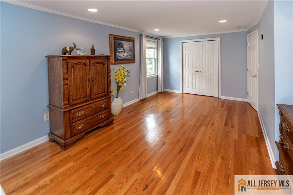 429 Edgeworth Street Middlesex, NJ 08846 - Photo 12 of 23 a view of a hallway with wooden floor