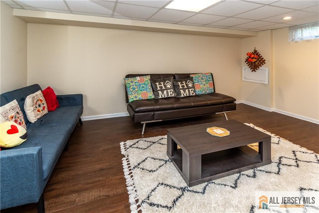 429 Edgeworth Street Middlesex, NJ 08846 - Photo 18 of 23 a living room with furniture and a couch