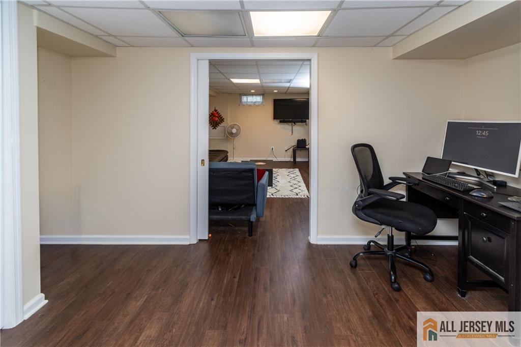 429 Edgeworth Street Middlesex, NJ 08846 - Photo 20 of 23 a view of a workspace with furniture and wooden floor