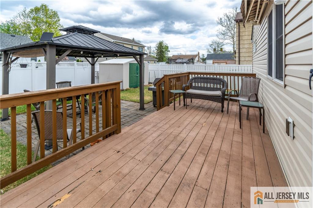 429 Edgeworth Street Middlesex, NJ 08846 - Photo 23 of 23 a view of balcony with wooden floor and outdoor seating
