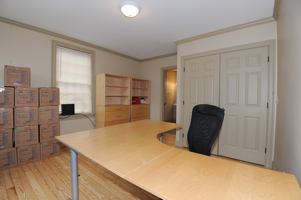 265 Leverett Road Amherst, MA 01002 - Photo 14 of 30 a workspace with furniture and wooden floor