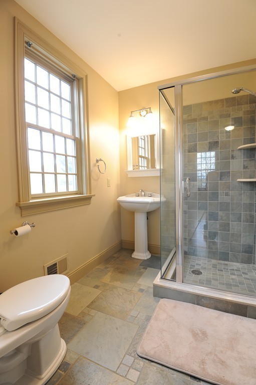 265 Leverett Road Amherst, MA 01002 - Photo 16 of 30 a bathroom with a toilet a sink and shower