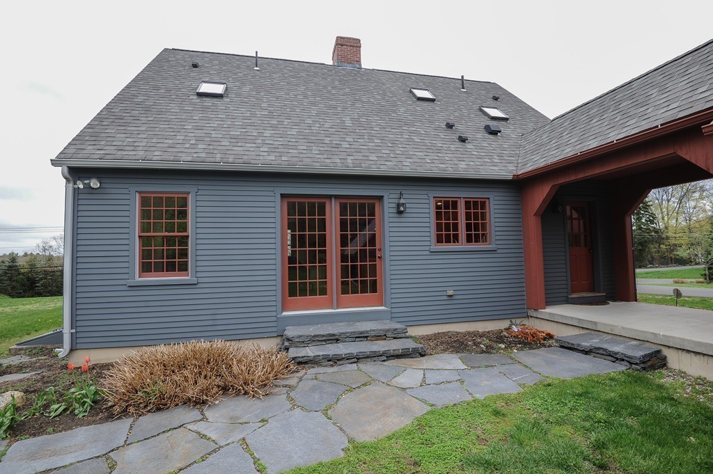 265 Leverett Road Amherst, MA 01002 - Photo 24 of 30 a front view of a house with garden