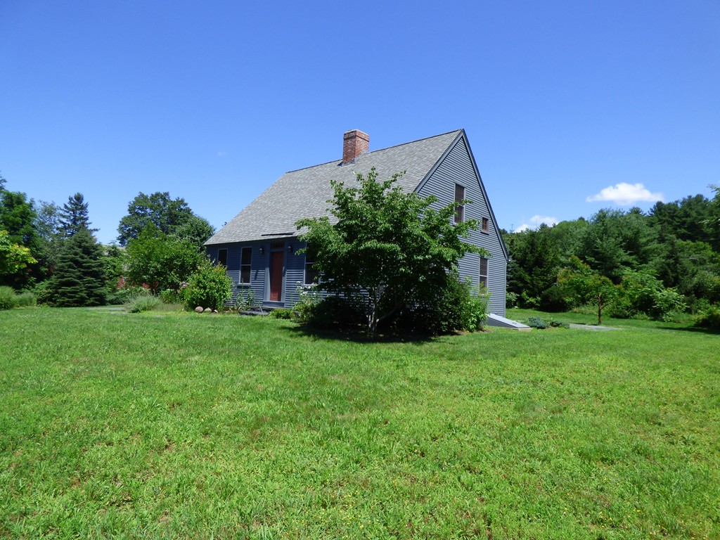 265 Leverett Road Amherst, MA 01002 - Photo 26 of 30 a front view of a house with a yard