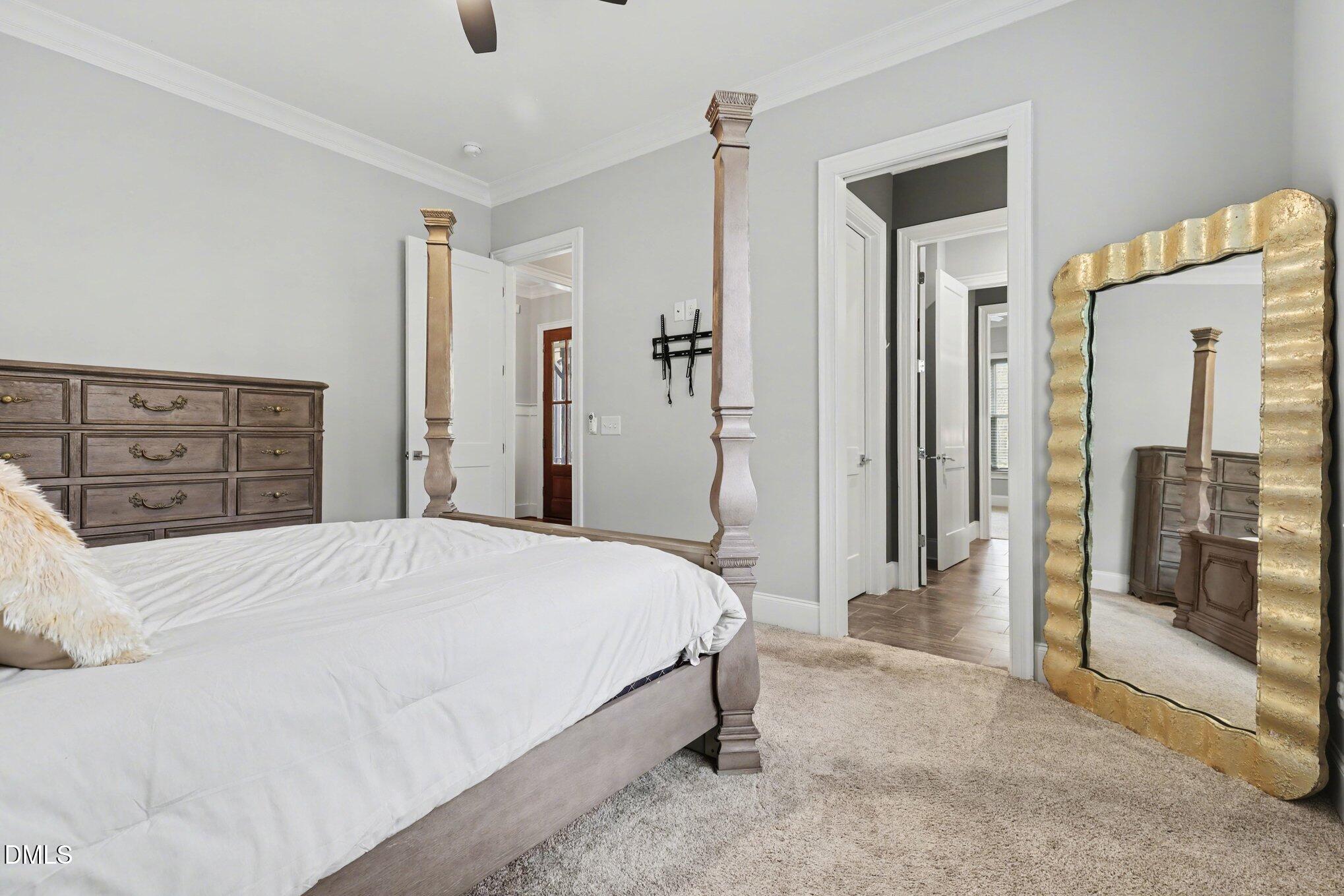 7433 Sextons Creek Drive Raleigh, NC 27614 - Photo 10 of 20 a bedroom with a bed and a dresser