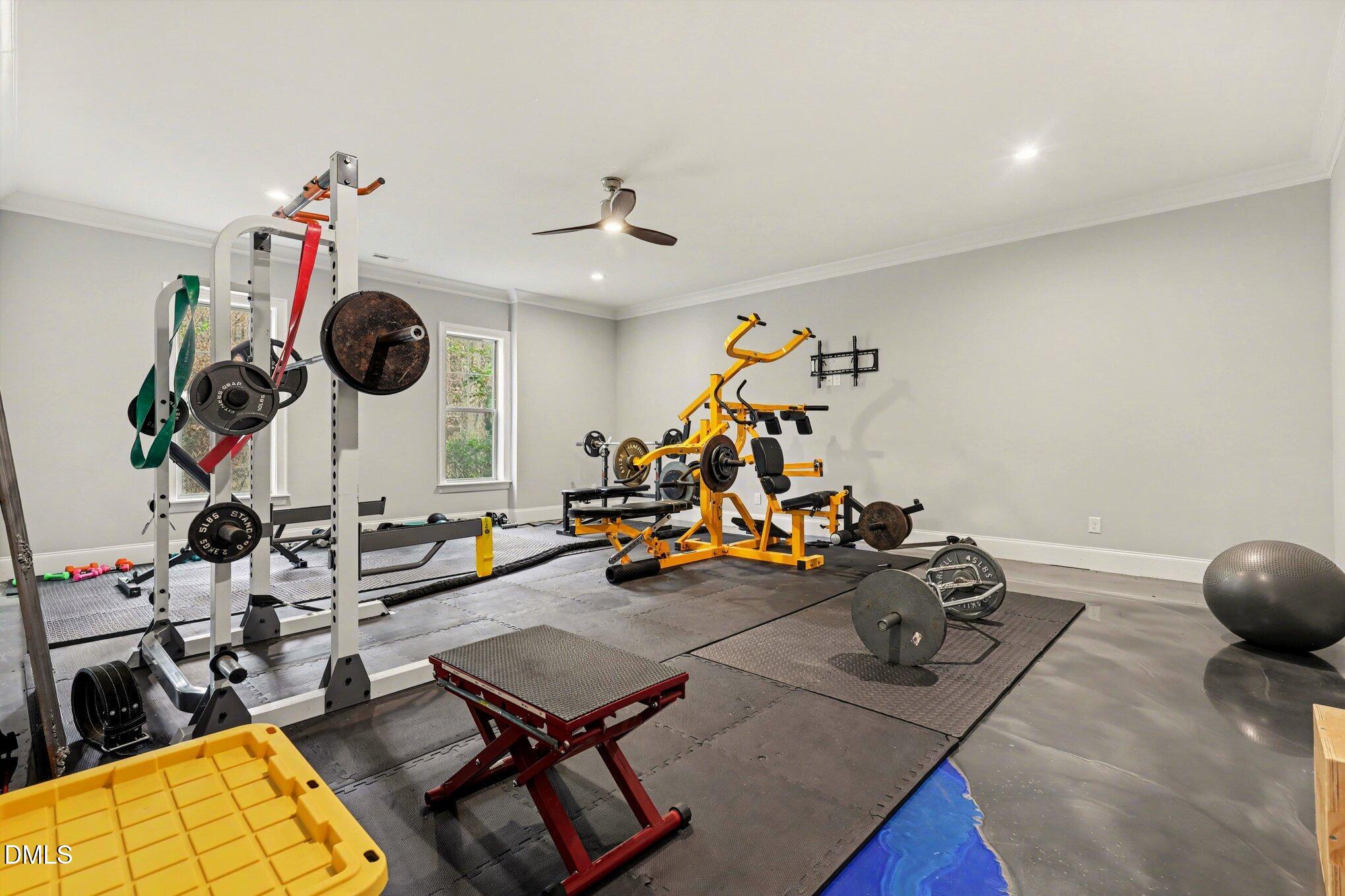 7433 Sextons Creek Drive Raleigh, NC 27614 - Photo 13 of 20 a view of a room with gym equipment