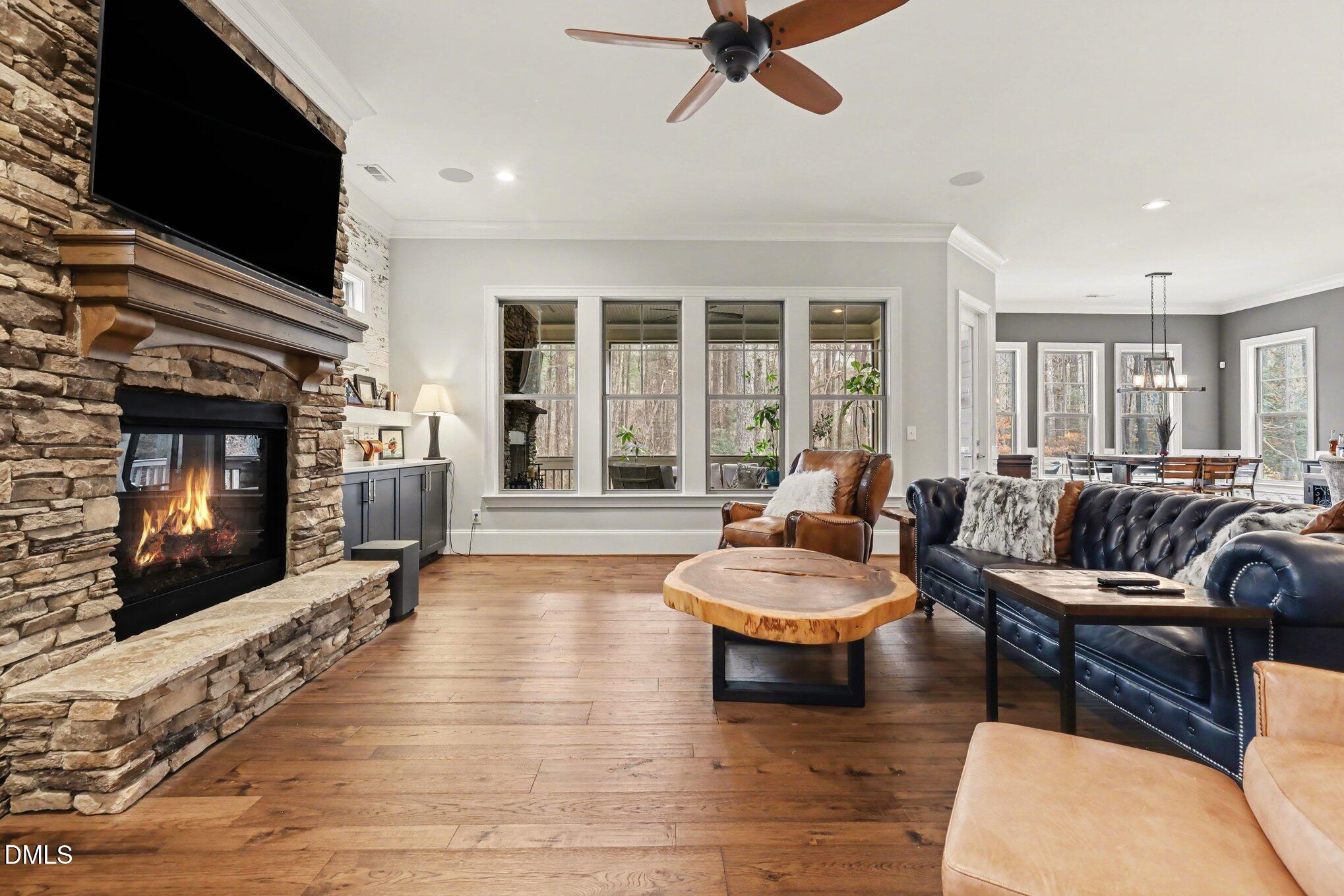 7433 Sextons Creek Drive Raleigh, NC 27614 - Photo 5 of 20 a living room with furniture and a fireplace