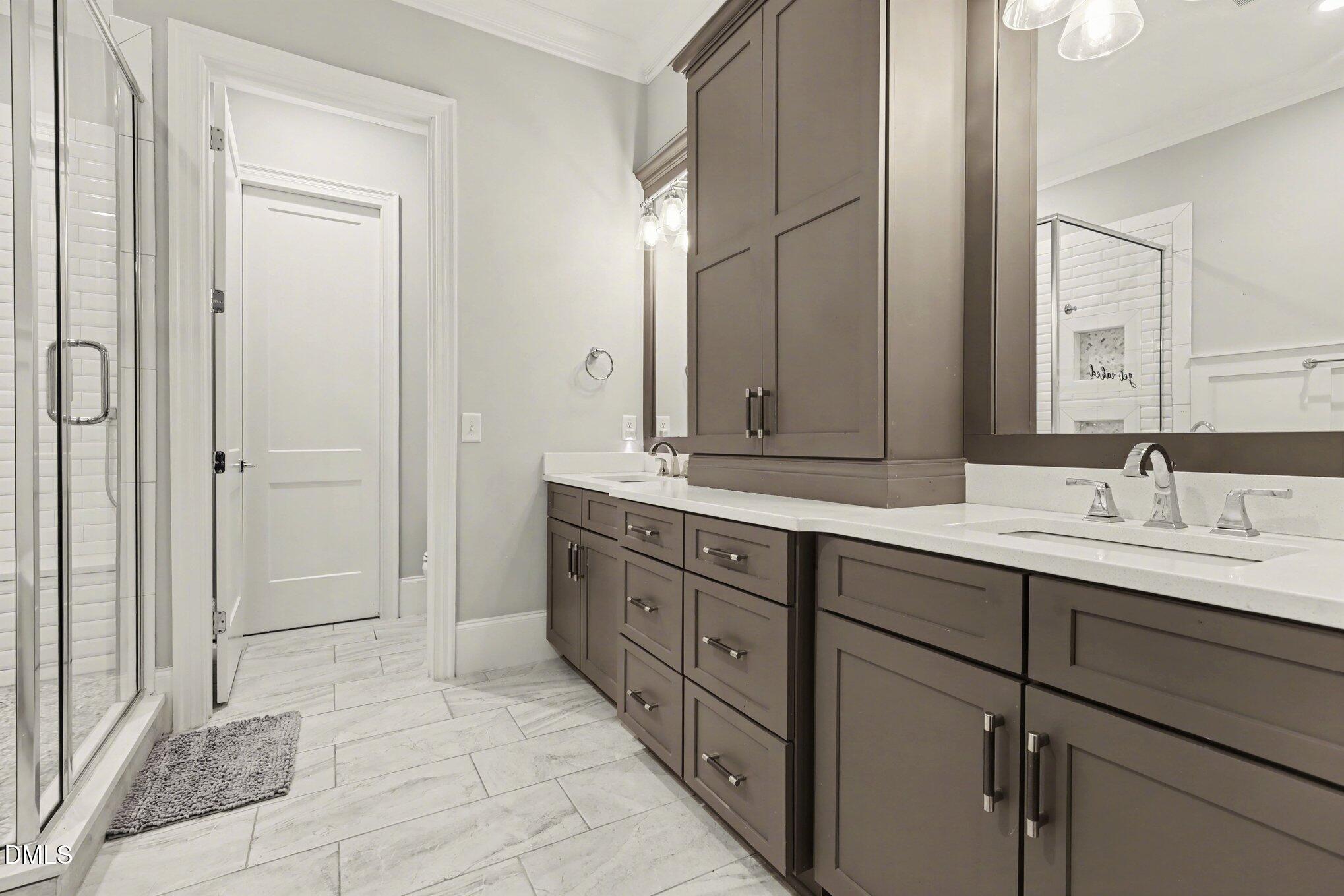7433 Sextons Creek Drive Raleigh, NC 27614 - Photo 6 of 20 a spacious bathroom with a double vanity sink a mirror and a