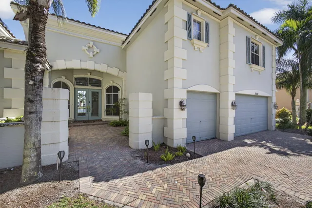 a front view of a house with a porch
