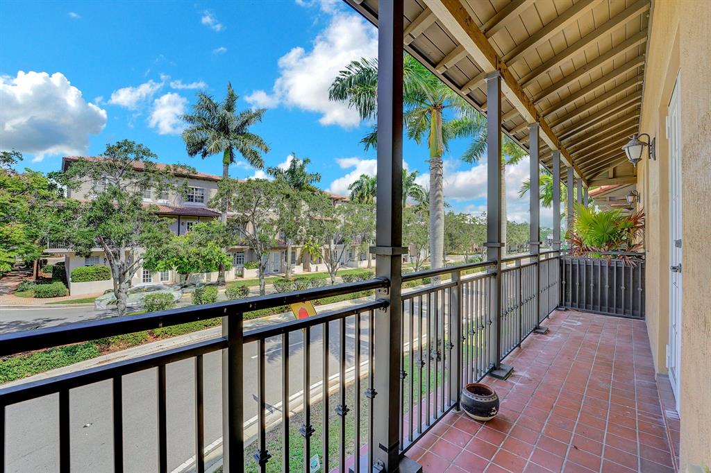 454 Southwest 147th Avenue, Unit 4601 Pembroke Pines, FL 33027 - Photo 11 of 45 a view of a street with a balcony