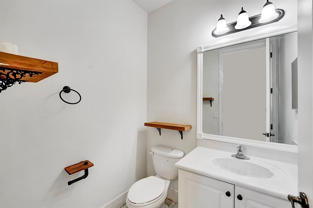 454 Southwest 147th Avenue, Unit 4601 Pembroke Pines, FL 33027 - Photo 20 of 45 a bathroom with a sink mirror and vanity