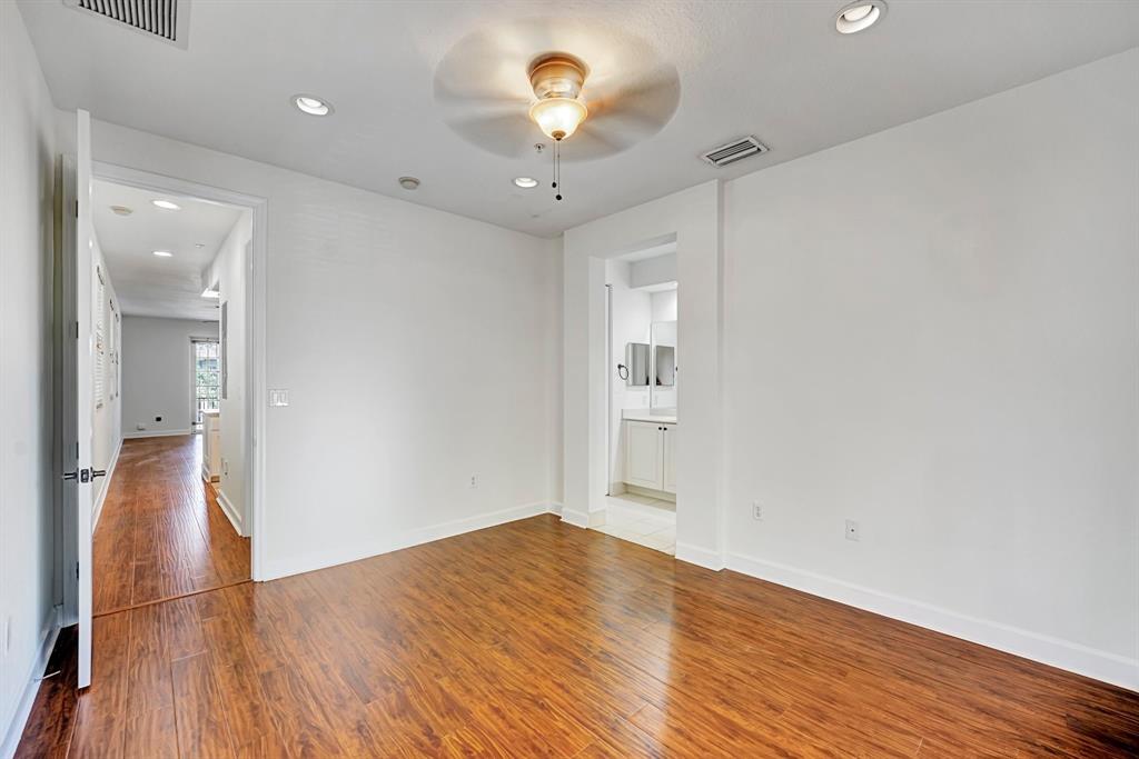 454 Southwest 147th Avenue, Unit 4601 Pembroke Pines, FL 33027 - Photo 21 of 45 a view of empty room with wooden floor