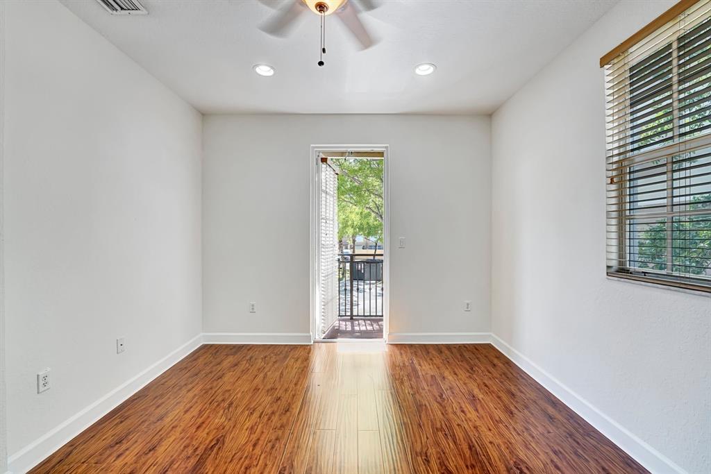 454 Southwest 147th Avenue, Unit 4601 Pembroke Pines, FL 33027 - Photo 26 of 45 wooden floor in an empty room with a window