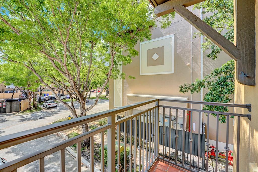 454 Southwest 147th Avenue, Unit 4601 Pembroke Pines, FL 33027 - Photo 27 of 45 a view of a balcony with wooden fence and floor