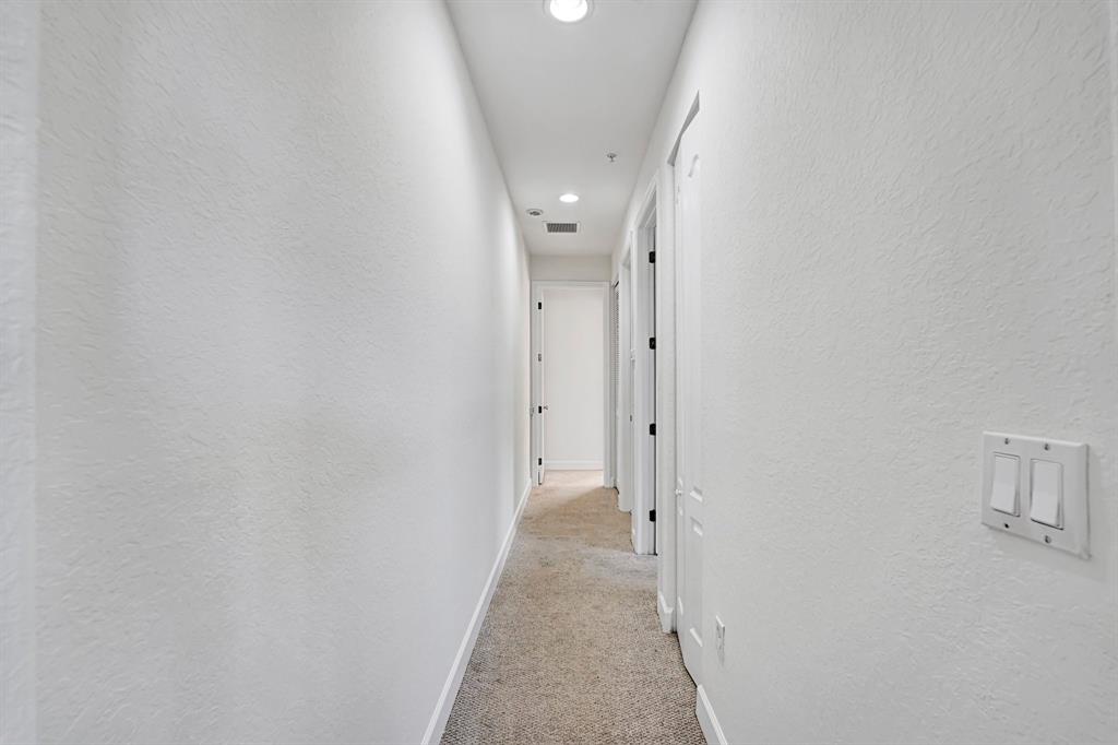 454 Southwest 147th Avenue, Unit 4601 Pembroke Pines, FL 33027 - Photo 31 of 45 a view of a hallway