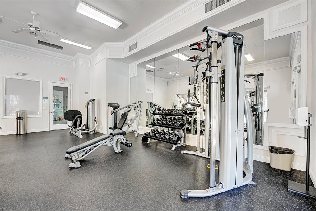 454 Southwest 147th Avenue, Unit 4601 Pembroke Pines, FL 33027 - Photo 39 of 45 a view of a room with gym equipment