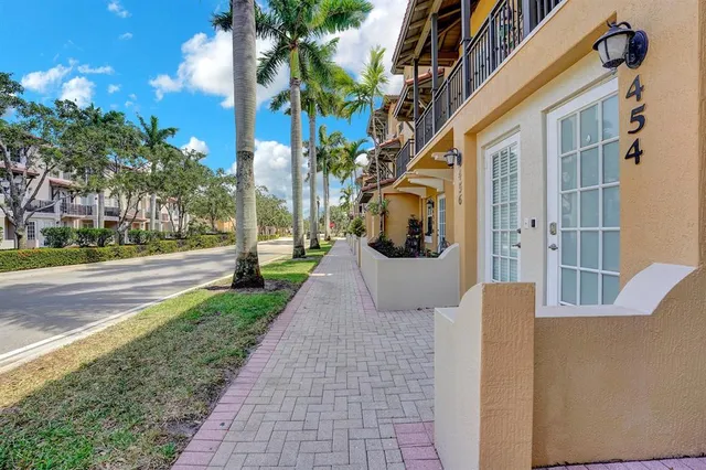 a view of a building with a yard