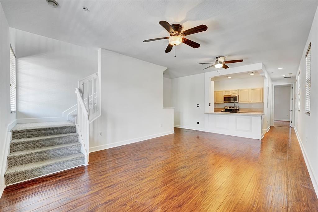 454 Southwest 147th Avenue, Unit 4601 Pembroke Pines, FL 33027 - Photo 7 of 45 a view of a living room and wooden floor