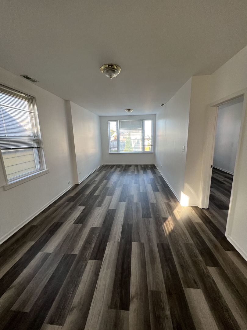 4533 South Richmond Street, Unit 2 Chicago, IL 60632 - Photo 2 of 7 a view of a room with wooden floor