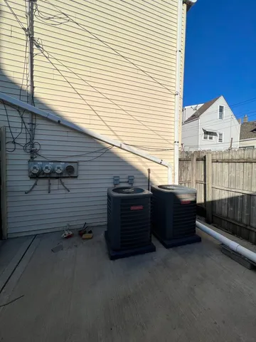 a view of a garage with a table and chairs