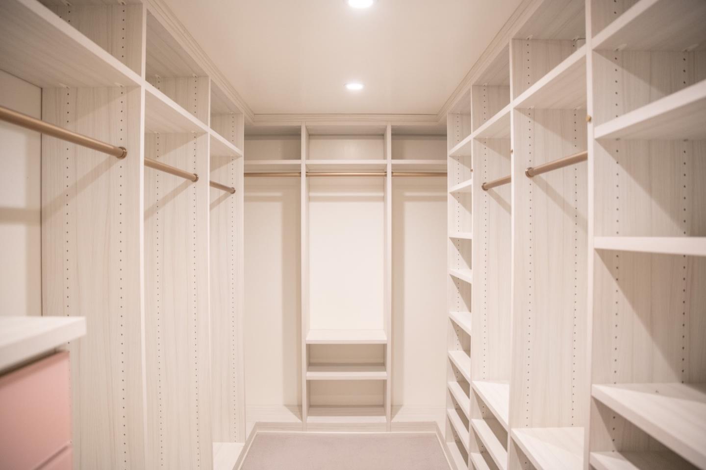 25990 Junipero Street Carmel, CA 93923 - Photo 12 of 26 a view of walk in closet with empty racks