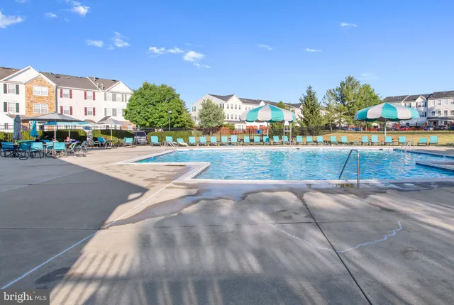 a view of a street with a building in the background