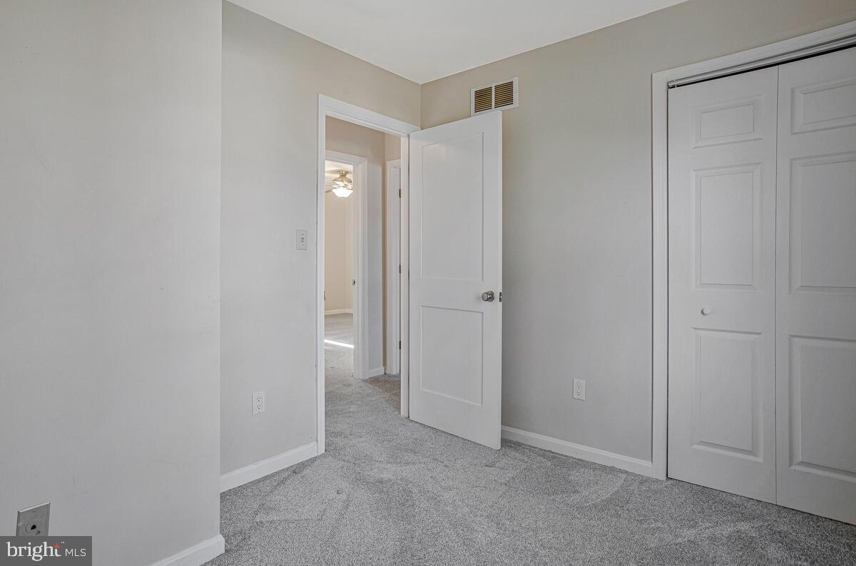 735 Whitehall Beach Road Annapolis, MD 21409 - Photo 11 of 35 a view of an empty room