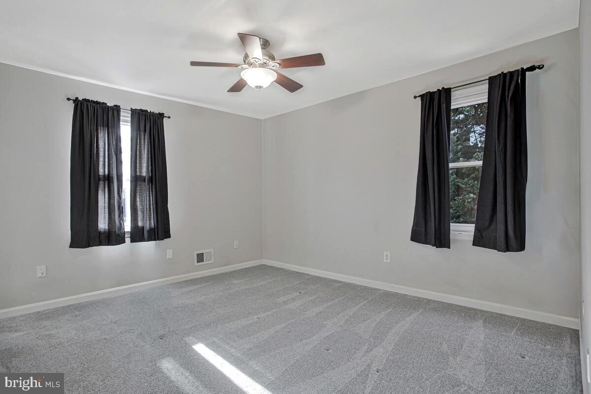 735 Whitehall Beach Road Annapolis, MD 21409 - Photo 15 of 35 an empty room with window