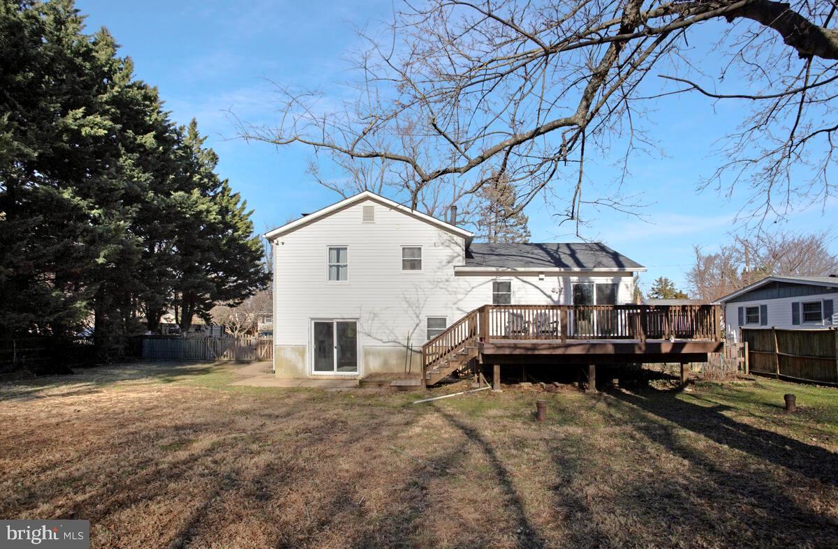 735 Whitehall Beach Road Annapolis, MD 21409 - Photo 23 of 35 a view of a house with a yard
