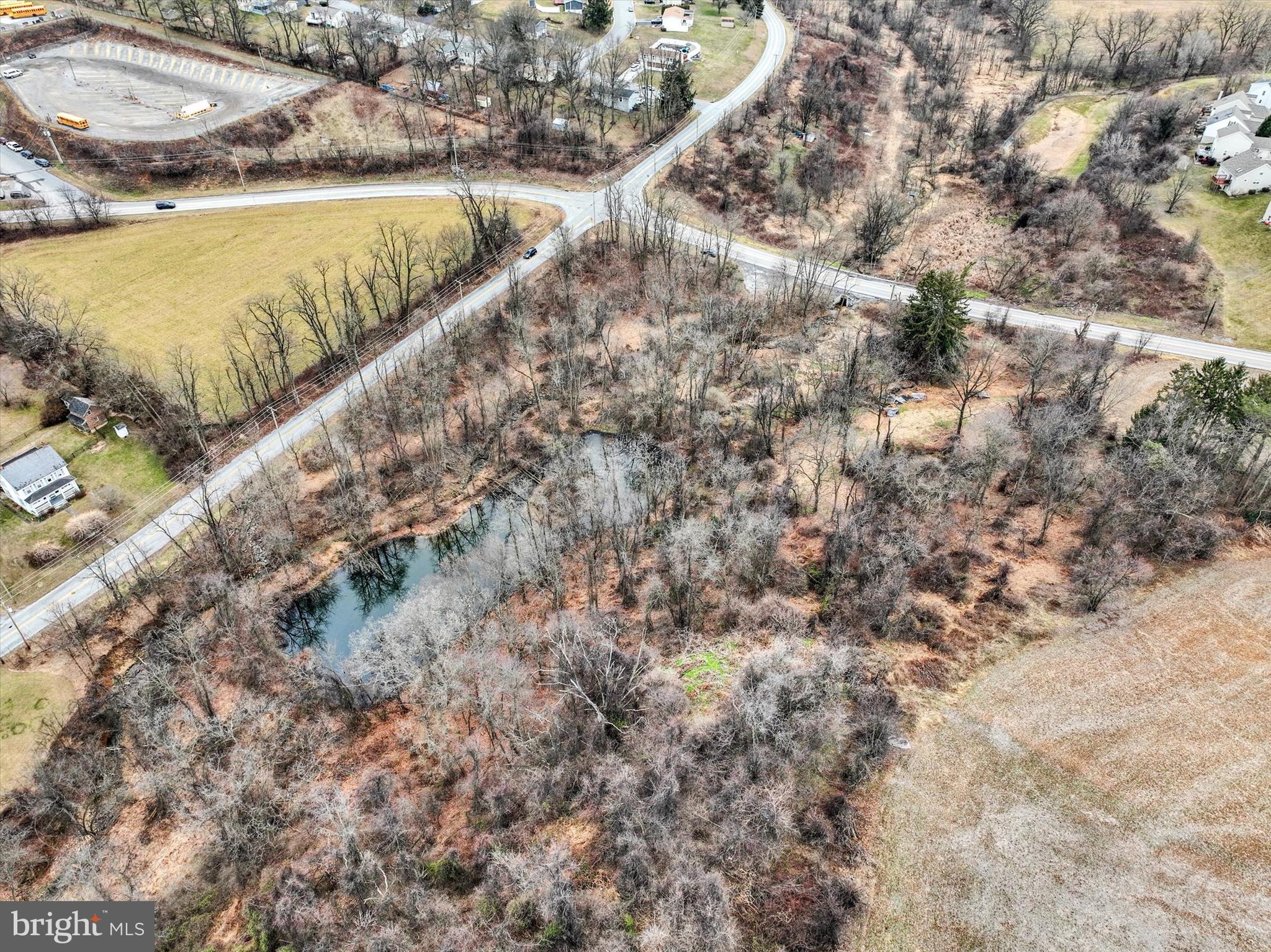 695 Oak Road Dallastown, PA 17313 - Photo 5 of 17 a view of a water pond with lots of trees
