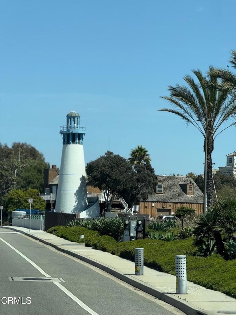 920 Catamaran Street Oxnard, CA 93035 - Photo 13 of 17 a front view of a house with a yard and garage