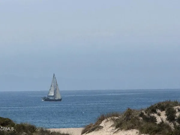 a view of a wooden floor with a sink
