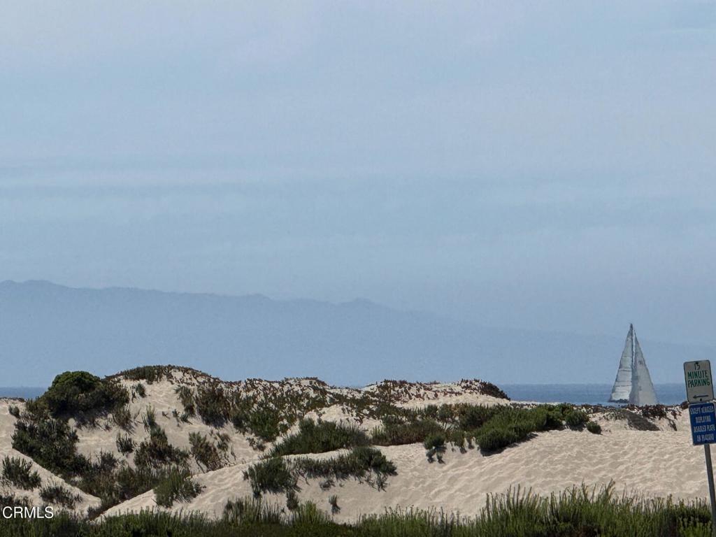 920 Catamaran Street Oxnard, CA 93035 - Photo 6 of 17 a bed sitting in a bedroom next to a window