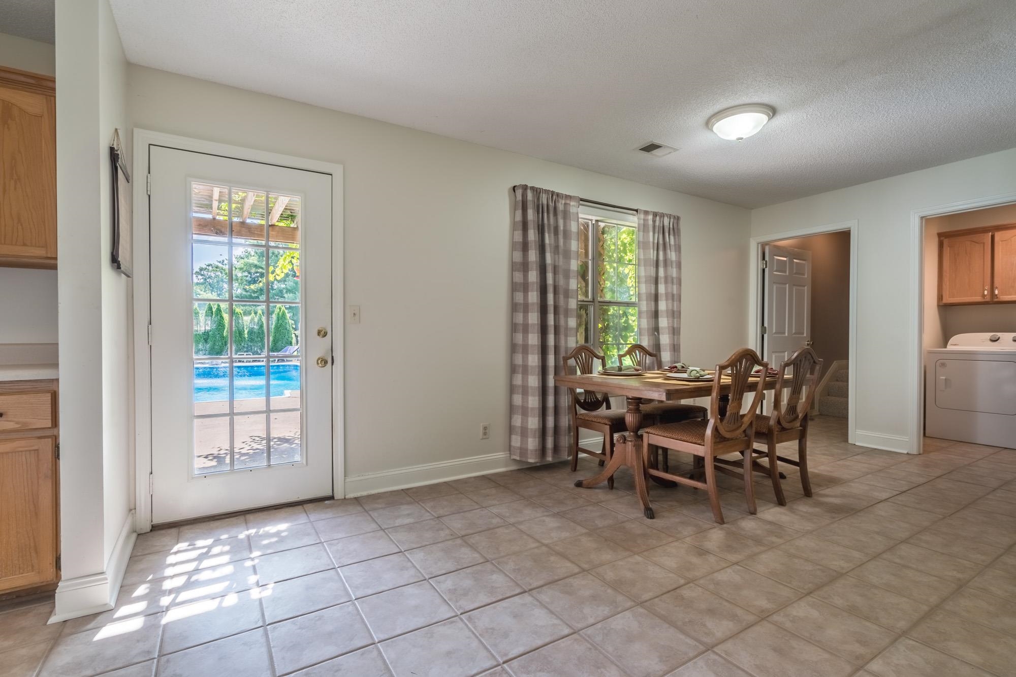 192 Madison Drive Atoka, TN 38004 - Photo 17 of 23 a view of a dining room with furniture and window