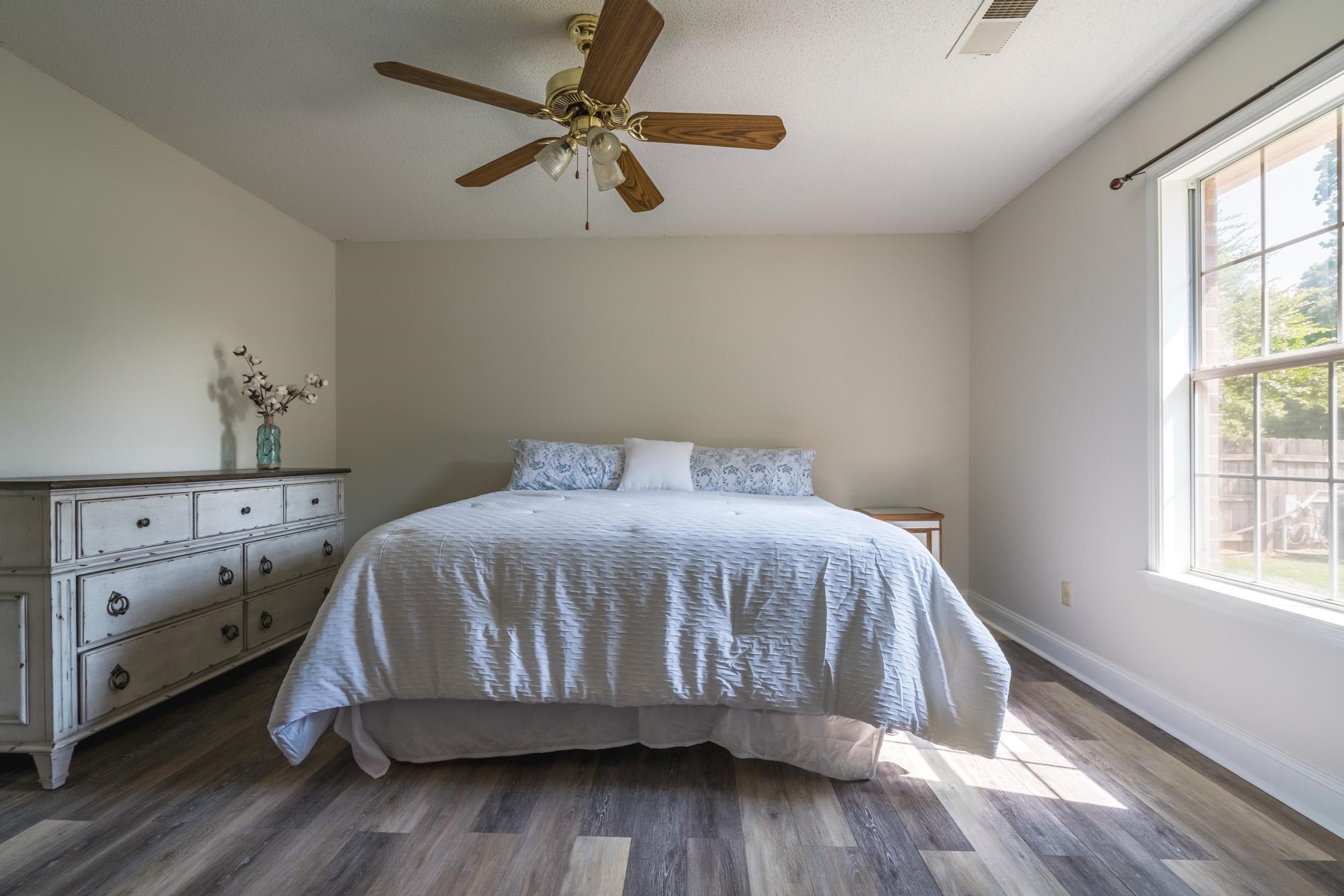 192 Madison Drive Atoka, TN 38004 - Photo 19 of 23 a bedroom with a bed and a window