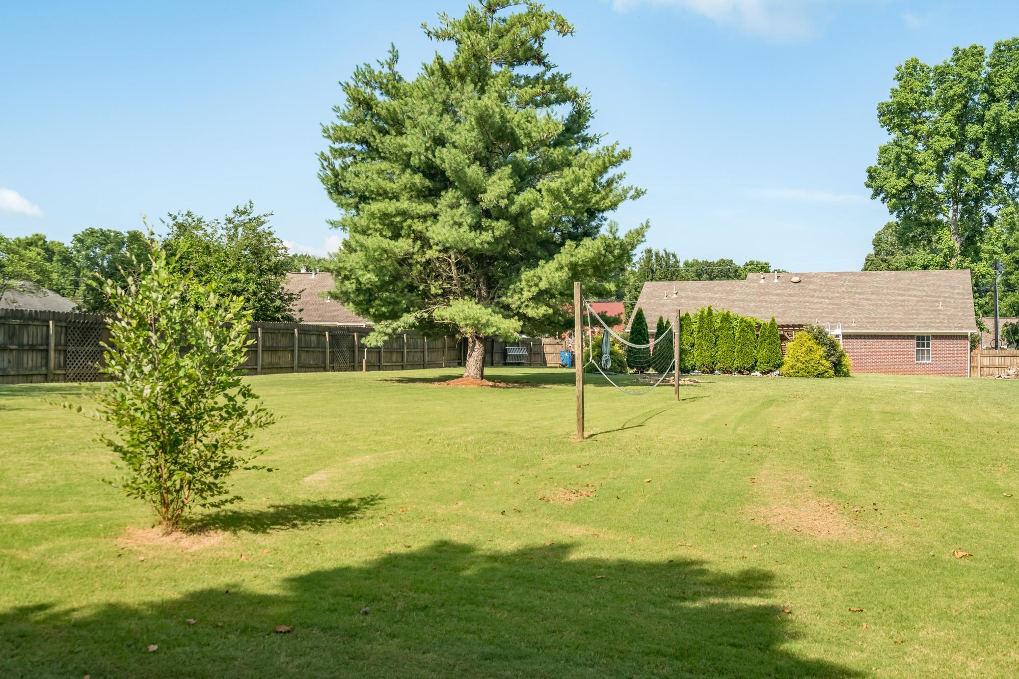 192 Madison Drive Atoka, TN 38004 - Photo 22 of 23 a view of a yard with swimming pool