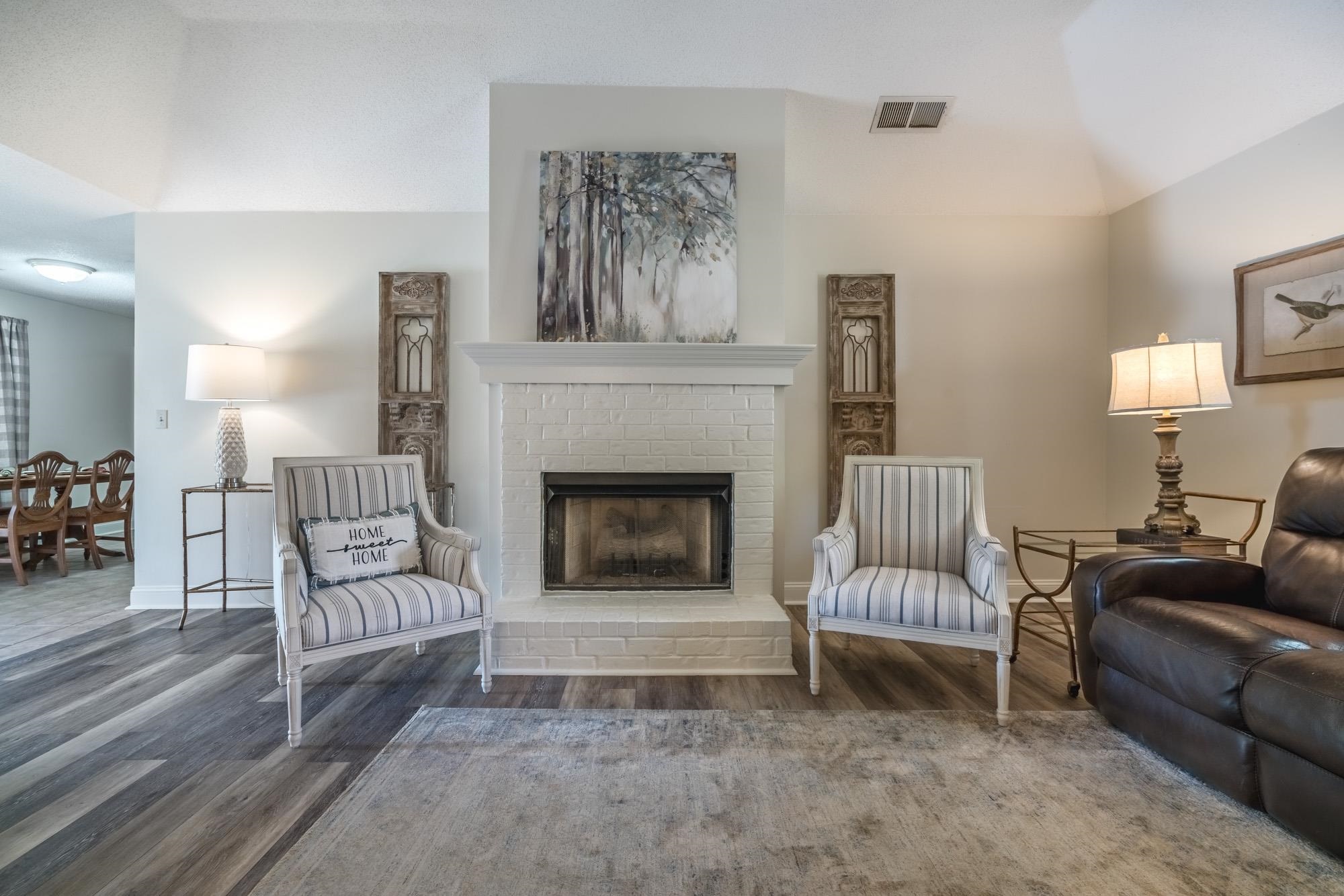 192 Madison Drive Atoka, TN 38004 - Photo 6 of 23 a living room with furniture and a fireplace