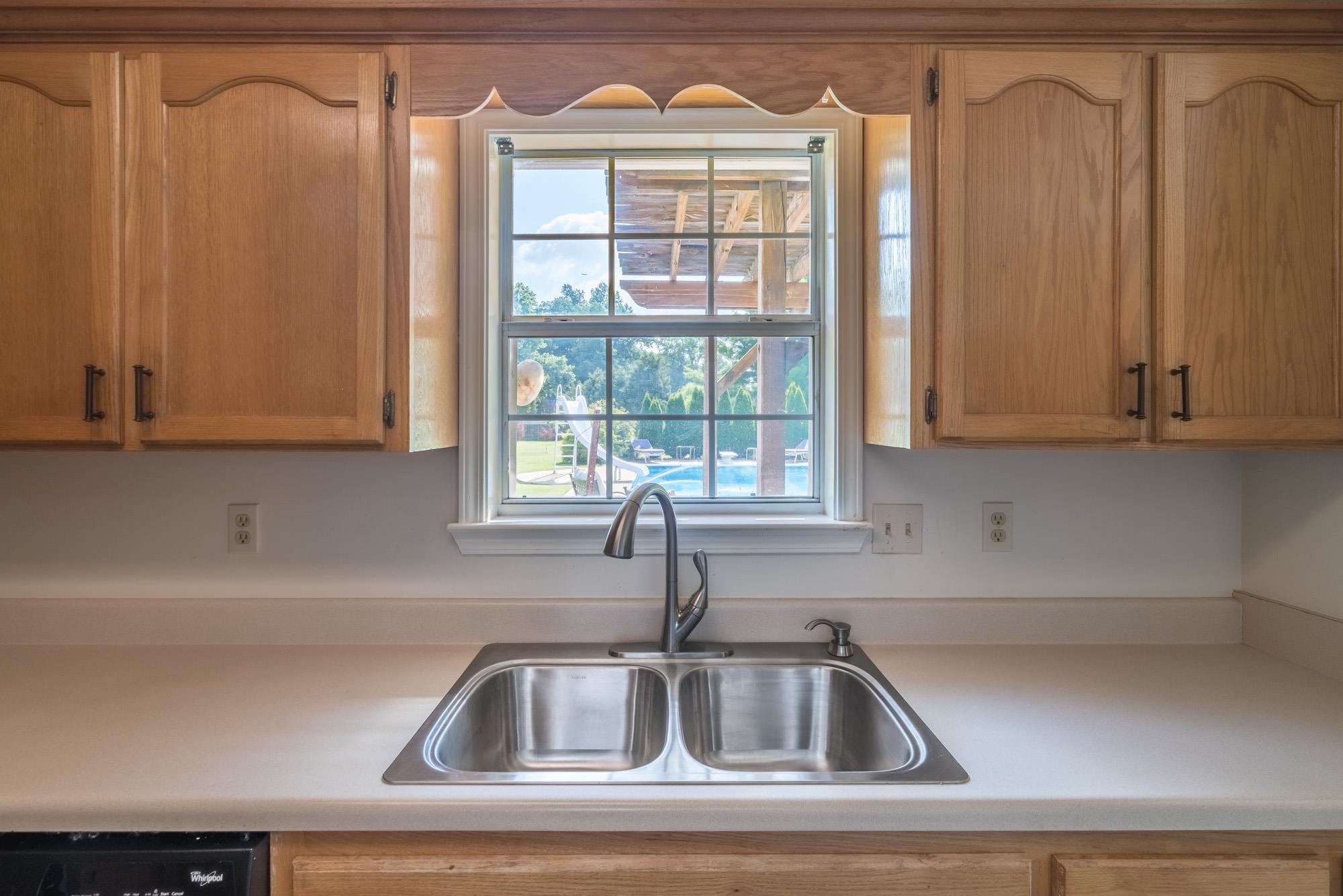 192 Madison Drive Atoka, TN 38004 - Photo 10 of 23 a kitchen with a sink and cabinets