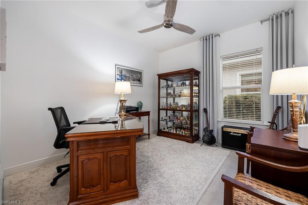 3620 Pilot Circle Naples, FL 34120 - Photo 30 of 49 a work room with furniture a rug and a window