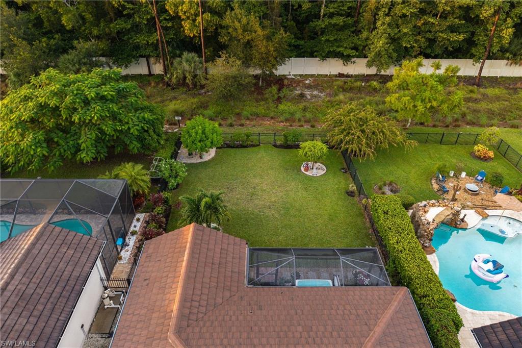 3620 Pilot Circle Naples, FL 34120 - Photo 48 of 49 an aerial view of a house with a yard basket ball court and outdoor seating