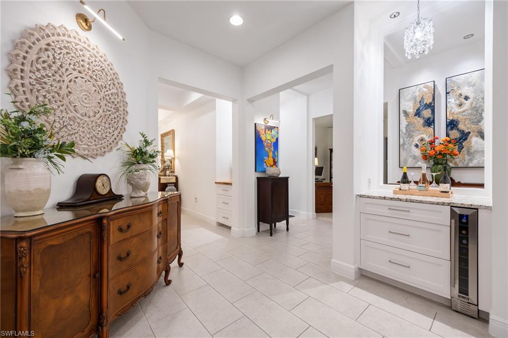 3620 Pilot Circle Naples, FL 34120 - Photo 6 of 49 a kitchen with stainless steel appliances a stove and cabinets
