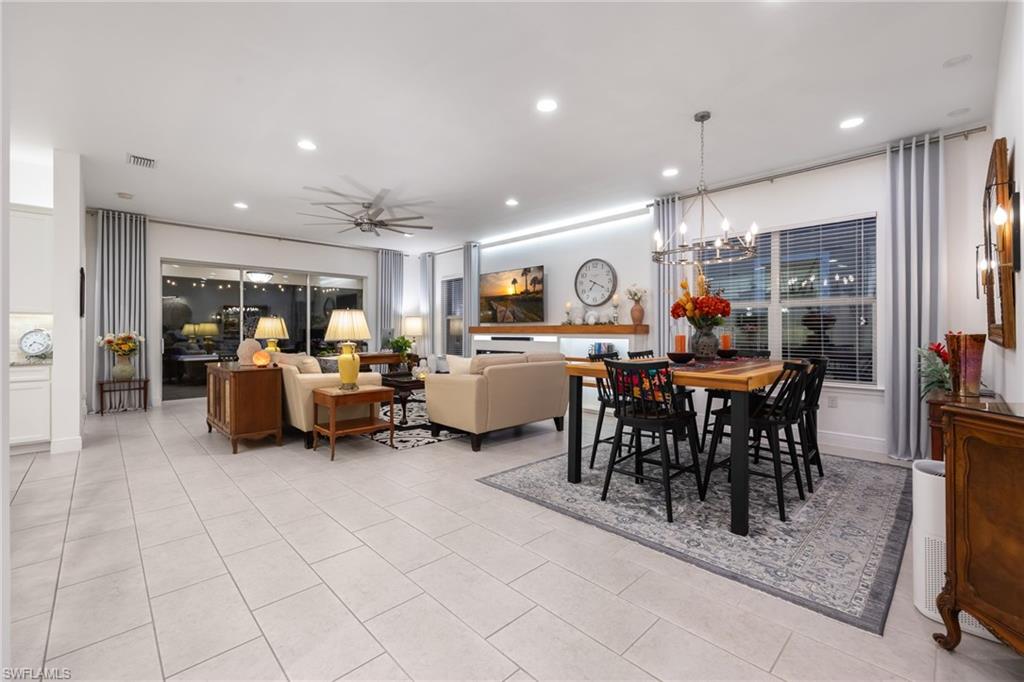 3620 Pilot Circle Naples, FL 34120 - Photo 10 of 49 a living room with lots of furniture and a large window