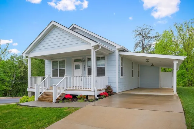 a house view with a garden space