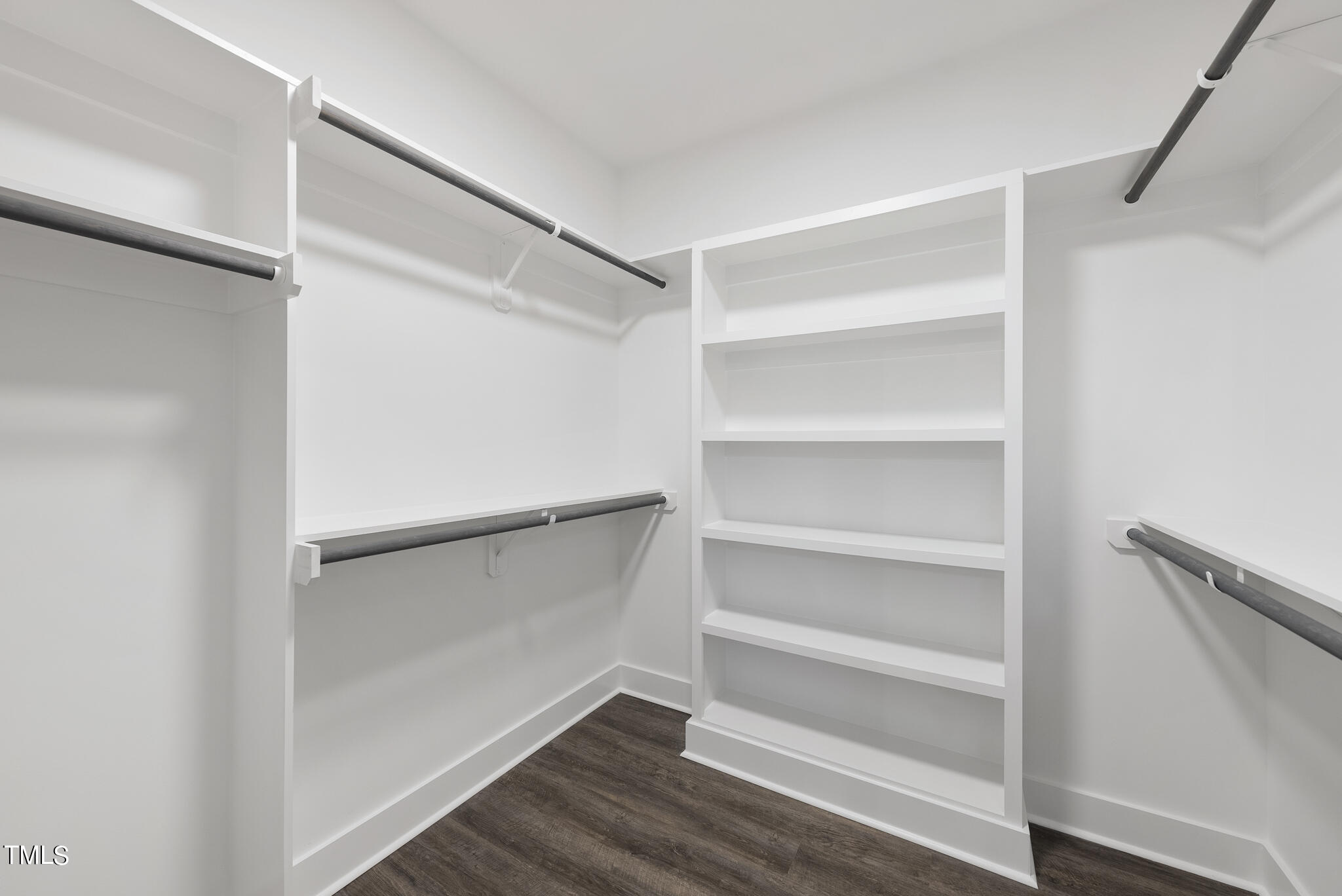 100 Pilot Ridge Road Zebulon, NC 27597 - Photo 17 of 29 a view of walk in closet with empty racks