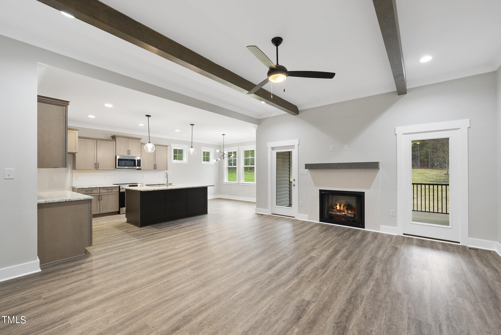 100 Pilot Ridge Road Zebulon, NC 27597 - Photo 4 of 29 a view of kitchen with cabinets and wooden floor